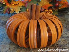 a fake pumpkin made out of plastic hoses