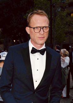 a man in a tuxedo and bow tie