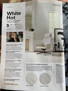 an article in the interior design magazine about white chairs and rugs for living room