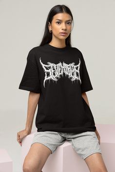 "Seventeen Heavy Metal Text T-shirt *size up 2 sizes for oversized fit* This t-shirt is everything you've dreamed of and more. It feels soft and lightweight, with the right amount of stretch. It's comfortable and flattering for both men and women. * 100% Printed In The U.S.A - Ship Worldwide. Safe & Secure Checkout. * 100% combed and ring-spun cotton (heather colors contain polyester) * Fabric weight: 4.2 oz (142 g/m2) * Shoulder-to-shoulder taping * Side-seamed * Very High Quality ⭐️HOW TO ORDE Oversized Grunge T-shirt With Logo Print, Drop Shoulder Letter Print T-shirt For Streetwear, Oversized Grunge Tops With Logo Print, Grunge Text Print Shirt For Streetwear, Edgy Relaxed Fit T-shirt With Logo Print, Edgy Oversized White T-shirt, White Oversized Edgy T-shirt, Drop Shoulder Graphic Tee For Streetwear, Oversized Band Merch T-shirt With Logo Print