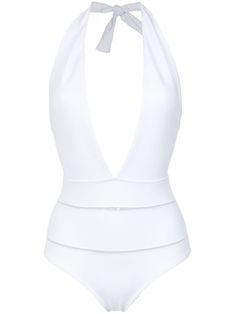 White halterneck swimsuit from Amir Slama featuring a deep V neck. Swimwear must be tried on over your own garments. This item is true to fit. Please note this item has a brazilian cut. Spring Swimsuit, Halter Top Bathing Suits, Leopard Print Swimsuit, Designer Beach Wear, Halter Neck Swimsuit, Cut Out Swimsuits, White Swimsuit, Printed Maxi Skirts, Swimsuits Halter