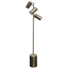 a metal floor lamp with three cups on it's top and one light on the bottom