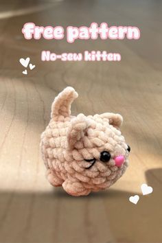 a small crocheted animal sitting on top of a wooden floor with the caption free pattern no - sew kitten