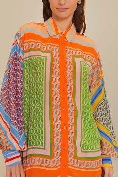 Details Size Chart Embrace vibrant elegance with the Cashew Mix Long Sleeve Shirt, a mesmerizing dance of print and color that evokes Brazil's joyful spirit. Its bold cashew motifs are artfully placed against an array of geometric patterns, creating a harmonious clash that sings on the luxurious fabric. This piece features a classic collar neckline, anchoring the vivacious design, while the relaxed silhouette offers both comfort and a touch of sophistication. Length: Hip-Length Material: Polyester Sleeve Type: Balloon Sleeve Neckline: Shirt Collar Style: Vacation Wear Fit Style: Loose Fit @Note: Size: please check measurements carefully Please allow 0.5-1" difference due to manual measurement Different monitor settings means colors may differ slightly 1" = 2.54cm @ Size(inch) Bust Length S Shirt Collar Styles, Evening Jewelry, Vacation Wear, Printed Balloons, Loose Shirt, Luxurious Fabric, Loose Shirts, Cozy Fits, Rose Dress