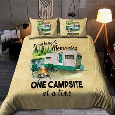 a bed with a camper on it and the words making memories one campsite at a time