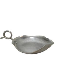 a metal spoon with a handle on the side and a hook in the middle that is attached to it