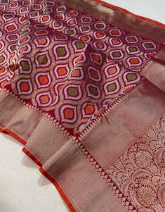 It is very beautiful pure banarasi katan silk handloom saree . It is a rare design . Perfect for brides .  Jangla - Tiffli Kaduwa weave, jangla, Tilffi weave, golden n silver  zari,  Weaving border with blouse piece.  Product Code:  BMSAWMO032 Saree length - 5.5 mtr. Blouse - 1 mtr.  Dry clean only . Please note - color may be vary a little due to sunlight and photography . Please message us after purchasing in case you want fall and Pico done it not . No extra charges for fall and Pico but info Handloom Saree, Bridal Saree, Indian Sarees, Blouse Piece, Halloween Shopping, Weaving, Beauty Book, Saree, Silk