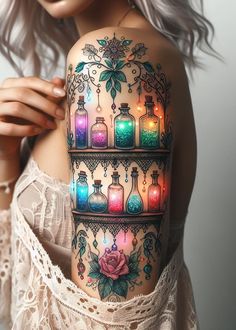 a woman with a tattoo on her shoulder and bottles in the shape of flowers are lit up