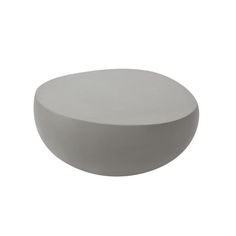 a white round object sitting on top of a table