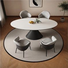 a round table with chairs around it