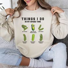 🥒 Embrace Your Pickle Passion with Style! 🥒 Introducing our exclusive "Pickles Lover" sweatshirt, the perfect blend of comfort and quirky charm for anyone obsessed with the tangy delight of pickles! Whether you're a dill enthusiast, a bread and butter buff, or you simply can't resist a crunchy gherkin, this sweatshirt is your ticket to cozy pickle perfection. Key Features: 👕 Super-soft and cozy fabric for all-day comfort 🎨 Vibrant, high-quality pickle-themed design 🌱 Made for pickle lovers, by pickle lovers Why You'll Love It: This sweatshirt isn't just a piece of clothing; it's a statement of your love for all things pickled. The eye-catching design proudly declares your allegiance to the briny goodness that is the pickle. It's perfect for casual outings, cozy nights in, or whenever Pickle Hoodie, Pickles Sweatshirt, Pickle Sweatshirt, Pickle Shirt, Pickle Gifts, Pickle Lover, Pickle Jar, Lover Sweatshirt, Pickle Jars