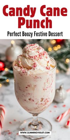 a dessert in a glass with candy canes on the side and text overlay that reads, candy cane punch perfect boy festive dessert