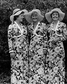 three women in matching dresses and hats pose for the camera, circa - 1950 news / getty images