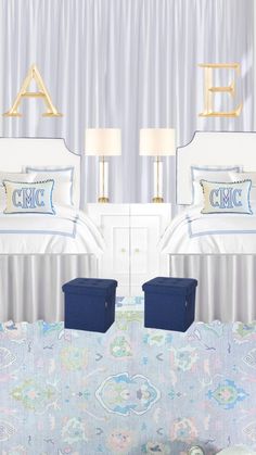 there are two beds in this room with blue and white decor on the bedding