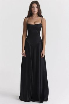 As a product expert, I present to you this elegant Lace-Up Satin Maxi Slipdress for women. Embrace comfort and style with a spaghetti strap design, lace-up details, and a backless cut. Perfect for club or evening parties, this black dress is a must-have in every femme's wardrobe. Elegant Backless Midi Dress With Built-in Bra, Backless Black Prom Dress, Backless Party Midi Dress With Built-in Bra, Party Satin Corset Dress With Built-in Bra, Sleeveless Evening Maxi Dress With Lace-up Back, Sleek Spaghetti Strap Maxi Dress For Formal Occasions, Chic Evening Slip Dress With Built-in Bra, Sleek Maxi Dress With Spaghetti Straps For Formal Occasions, Evening Sleeveless Backless Dress With Lace-up Back