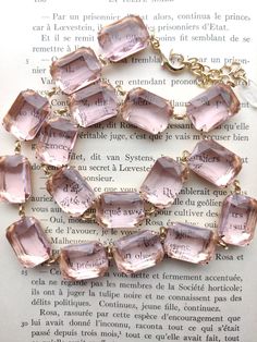 "Beautiful palest pink statement necklace with sparkling octagon crystals are like a ring of blushing roses around your neck. (Minus the thorns!) Inspired by the new Swarovski Millennium necklace and the collet necklaces worn by Anna Wintour. Each glass stone hand set and hand linked with high quality findings. Guaranteed to last a lifetime. Adjustable from 16 to 18\" with lobster claw and a 2\" extender. If you need it longer, just let me know! Each stone is 18 by 13mm, the perfect size to be s Bridgerton Necklace, Jane Austen Gifts, Pink Statement Necklace, Georgian Jewelry, Anna Wintour, Olivia Palermo, Rose Gold Watch, Downton Abbey, Silver Pieces