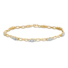 Dress her wrist in an elegant diamond bracelet that complements any attire. Crafted in warm 10K gold, this shimmering design features links with trios of sparkling diamonds alternating with infinity symbol-shaped links. Radiant with 1/10 ct. t.w. of diamonds and a brilliant buffed luster, this 7.25-inch bracelet secures with a lobster claw clasp. Formal Infinity Diamond Bracelet, Diamond Infinity Bracelet For Anniversary, Infinity Diamond Bracelet For Anniversary, Infinity Diamond Bracelet For Formal Occasions, Anniversary Diamond Bracelet With Infinity Design, Infinity Diamond Bracelet With Accents For Anniversary, Rose Ring, Infinity Symbol, Sparkle Diamonds