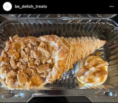 an ice cream sundae in a plastic container with waffles and caramel