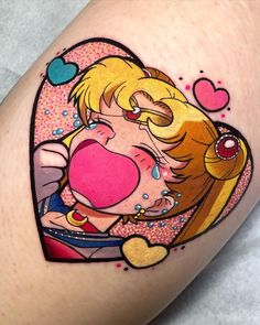 a woman's thigh with an image of a cartoon character blowing bubbles on it