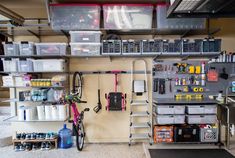 the garage is organized with various tools and supplies