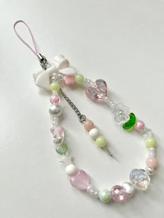 the necklace is made up of different colored beads