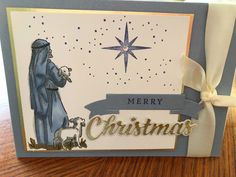 a christmas card with a nativity scene and a star on the top that says merry christmas