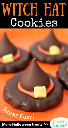 chocolate covered cookies with candy on top and the words witch hat cookies written in white