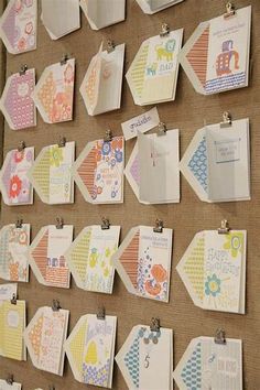 a bulletin board covered in lots of cards