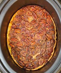 the recipe for crockpot pecan pie is displayed in an appliance