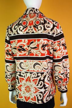 "Cool Vintage 70s Brown & Orange Psychedelic Paisley Pattern Hippie Blouse Top Shirt Has some stretch. Shoulder 16\" (laid flat) Bust 20.5\" (laid flat) Length, Top to Bottom 25\" Bottom Opening 22\" (laid flat) Sleeve Length 21.5\" Sleeve Opening 3.5\" (laid flat) - has buttons Tag: none Condition: 2 Condition Scale: 1-Immaculate Vintage Condition (Rare) 2-Unnoticeable Vintage Wear or Spots that are unphotographable 3-Small Noticable Vintage Wear or Spots, as photographed 4-A Lot of Noticab Fitted Long Sleeve Blouse With Bold Print, Fitted Retro Print Groovy Top, Fitted Groovy Retro Print Top, Fitted Groovy Top With Retro Print, Retro Patterned Top With Vintage Design, 1970s Long Sleeve Tops With Retro Print, 1970s Retro Print Long Sleeve Tops, 1970s Style Long Sleeve Tops With Retro Print, Vintage Long Sleeve Blouse With Paisley Print