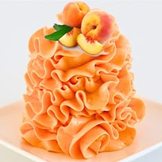 there is a cake with peaches on top