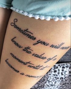 a woman with a tattoo on her leg that says sometimes you will know the value of moments