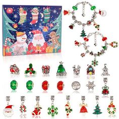 christmas jewelry set with santa claus and other holiday items in front of a card box