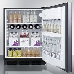 an open refrigerator filled with lots of drinks