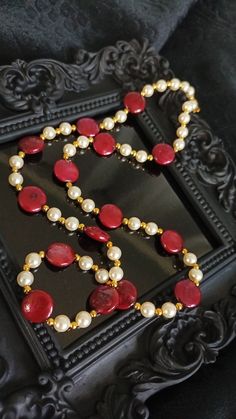 "~Marguerite's Debut~ A sumptuous necklace for when one wants to impress that handsome Duke (or Duchess)! Genuine freshwater coin pearls dyed a bright cranberry are paired with white glass pearls and gold-toned spacer beads. The simple screw style clasp will keep it safely 'round your neck. Materials: dyed* genuine freshwater coin pearls, glass pearls, gold-plated brass beads and findings, and Accu-Flex wire Size: necklace is approximately 23\". A note about freshwater pearls: not at all like th Brass Beads, Coin Pearls, Gold Pearl Necklace, Necklace Red, Gold Pearl, Cultured Pearls, Spacer Beads, White Glass, Cranberry