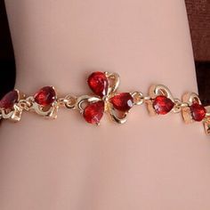 Gorgeous Austrian Ruby Flower Gold Bracelet Red Flower Bracelets For Valentine's Day, Elegant Red Flower Bracelets, Elegant Red Flower Bracelet, Ruby Flower, Womens Jewelry Bracelets, Gold Bracelet, Ruby, Jewelry Bracelets, Women Jewelry