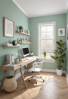 a home office with green walls and wooden flooring, white chair, potted plant on the desk