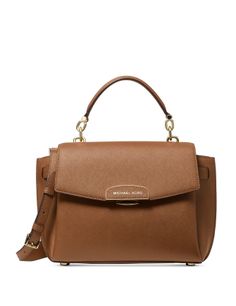 Luxe leather, a casual-cool silhouette and two convenient ways to carry make the Rochelle satchel a must-see, must-have design.Small sized bag 11-1/2"W x 7-1/2"H x 4"D (width is measured across the bottom of handbag)4-1/2"L handles; 23-1/2"L adjustable strapMagnetic flap closure18K gold-tone exterior hardware, 1 back slip pocket & 1 front slip pocket1 interior zip pocket & 1 front slip pocketLeatherColor: Luggage Cheap Gold Tote Satchel, Cool Silhouettes, Kate Spade Crossbody, Top Handle, Zip Pockets, Satchel, Top Handle Bag, Handles, Michael Kors