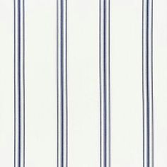 a white and blue striped wallpaper with vertical stripes on the bottom half of it