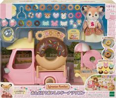 a toy truck with doughnuts and donuts in it