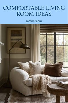 A cozy living room setup showcasing comfortable seating and warm decor. Discover tips on creating a inviting atmosphere in your home while incorporating stylish elements. Stylish Storage Solutions, Furniture Arrangement, Family Gathering, Living Area, Storage Solutions