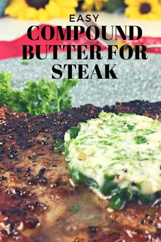 the steak is covered in sauce and garnished with parsley, on top of a plate