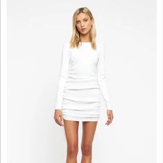 Nwt Lioness Military Minds Long Sleeve Dress - White Our Best Selling Dress Is Now Available In Long Sleeve! New And Improved Fabric And Fit Ribbed, Stretchy Fabrication Crew Neckline Pull Over Design Adjustable Drawstrings With Ruching At The Side Can Be Adjusted From A Mini Dress To A Full Length Dress 89% Viscose, 11% Nylon White Ruched Mini Dress For Fall, Denim Bodycon Dress, Green Princess, Magic Dress, White Long Sleeve Dress, Hot Pink Dresses, White Button Down Shirt, Faux Leather Dress, Full Length Dress