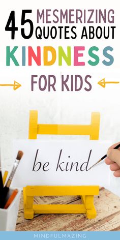 a person holding a sign with the words, be kind and be kind written on it