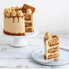 two pieces of cake on plates with one slice cut out and the other half eaten