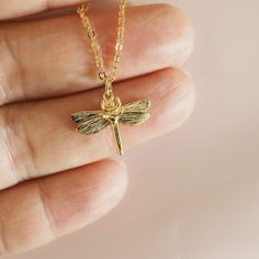 "Minimal and dainty gold dragonfly necklace made of matte finish gold plated dragonfly pendant with skinny gold plated brass chain. Sweet and soft. A perfect gift for birthday, anniversary, bridesmaids, graduation, friendship, sisters, and for you! All items are packed individually in a gift box :) ★ Chain length 14\" - 20\" ★ Pendant 5/8\" x 1/2\"  ★ Gold plated over brass  ★ Our production time is 1-4 business days ★ ★See more Nalydia jewelry  www.nalydia.etsy.com" Drangfly Necklace, Yellow Gold Dragonfly Jewelry For Gifts, Adjustable Gold Dragonfly Jewelry, Elegant Gold Dragonfly Necklace, Dragon Fly Pendant, Dragonfly Necklace, Dragonfly Pendant, Gift For Birthday, Brass Chain