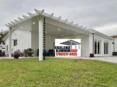 a white building with a sign on the front