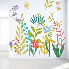 an image of flowers and plants painted on the wall