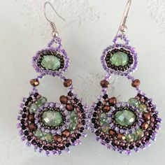 Artisan Czech Glass Bead Drop, Dangle Style Earrings Purple, Green In Glass Beads 2" Long Round Drop Dangle Earrings Handcrafted/No Two Are Exactly Alike Handmade In Guatemala Using Artisan Crafted Czech Glass Beads Easy To Use French Hook Style Closure. Czech Glass Beads Are Know World Wide For Their Quality, Vibrant Colors Please Visit Our Poshmark Boutique To See Our Wide Variety Of Beaded Jewelry Handmade Purple Chandelier Earrings As Gift, Handmade Purple Crystal Drop Earrings, Handmade Purple Amethyst Chandelier Earrings, Handmade Purple Chandelier Earrings For Party, Purple Beaded Chandelier Earrings For Party, Purple Faceted Beaded Round Earrings, Purple Faceted Beaded Earrings, Purple Dangle Beaded Earrings With Spacer Beads, Handmade Purple Beaded Round Earrings