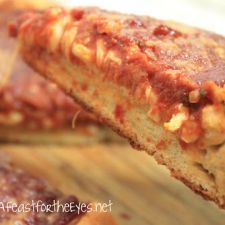 a close up of food on a cutting board